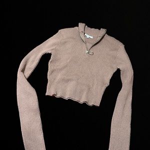 Cropped zip up sweater. Perfect for layering!